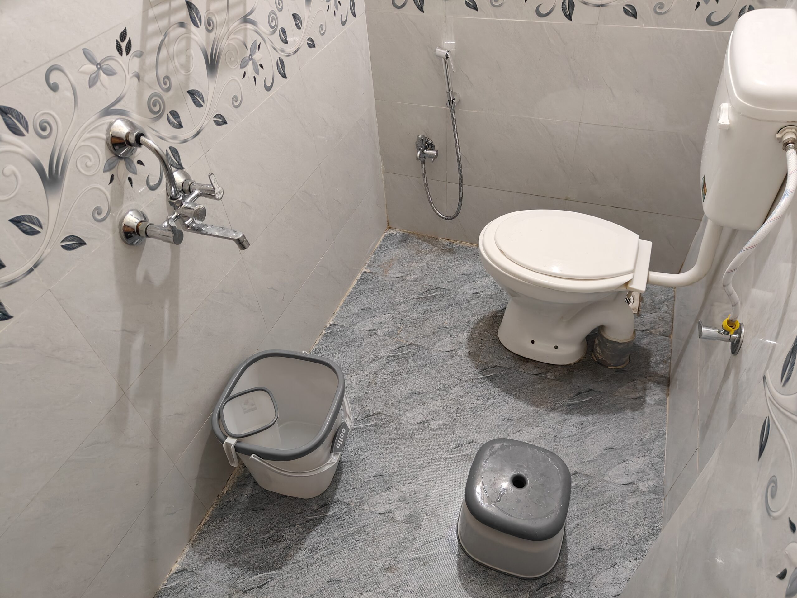 Clean modern washroom with geyser and fittings in Hinjewadi Phase 1 coliving
